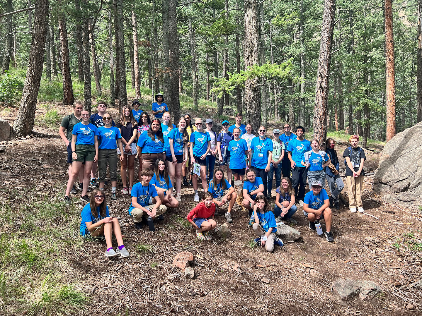 Youth Conservation Leadership Conference 2022 group photo in the woods